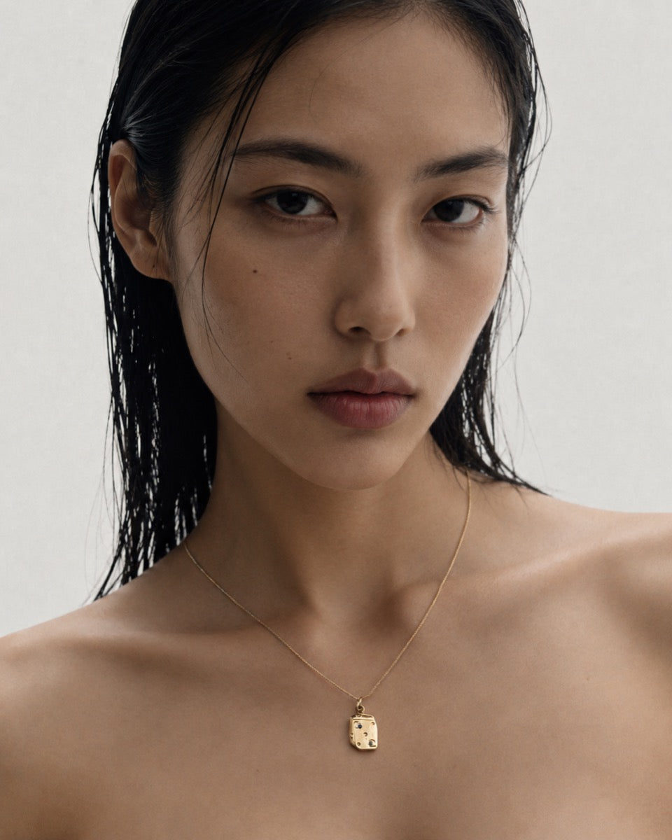 Assertive medallion necklace, gold plated vermeil finish, lifestyle